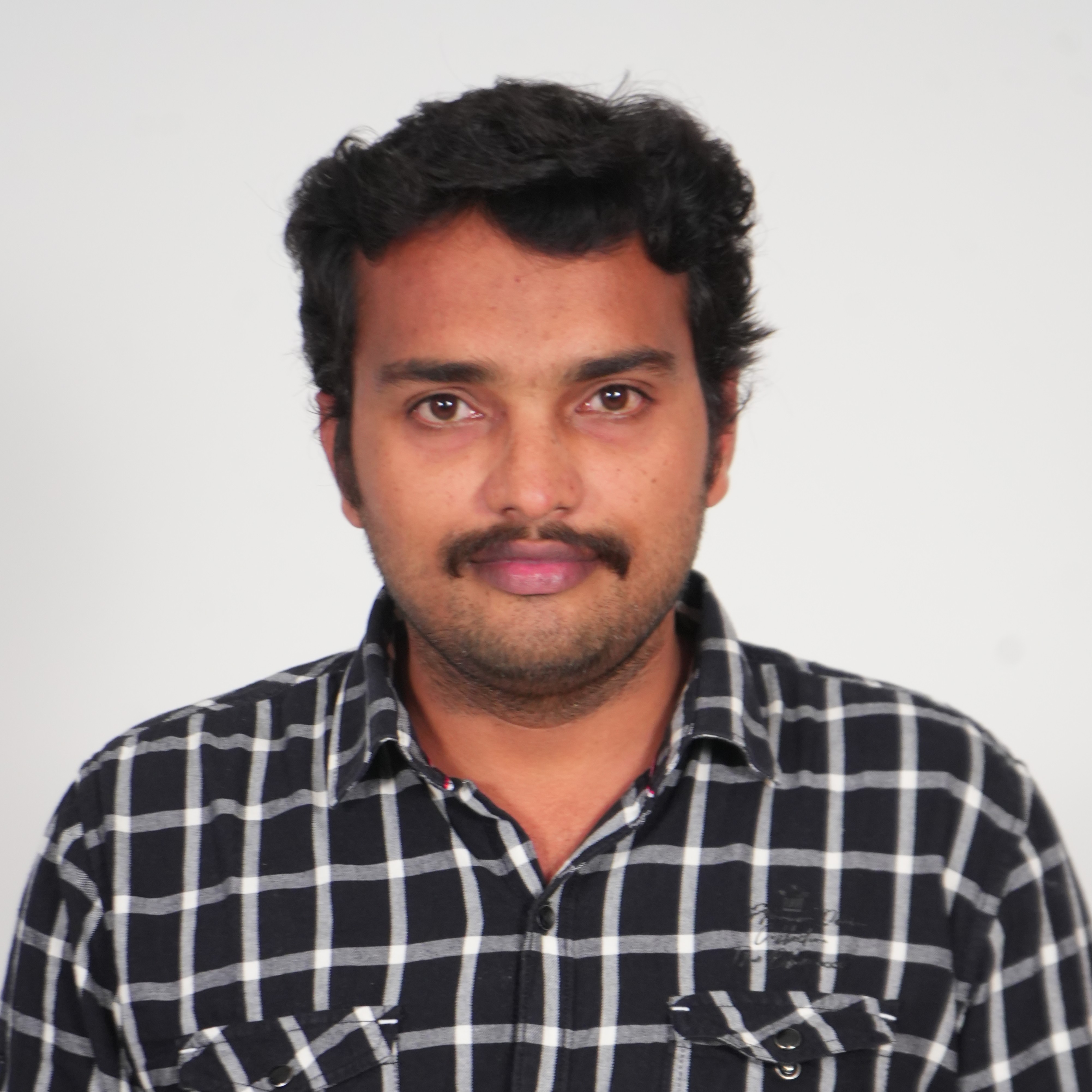 Dr. J. Ravi